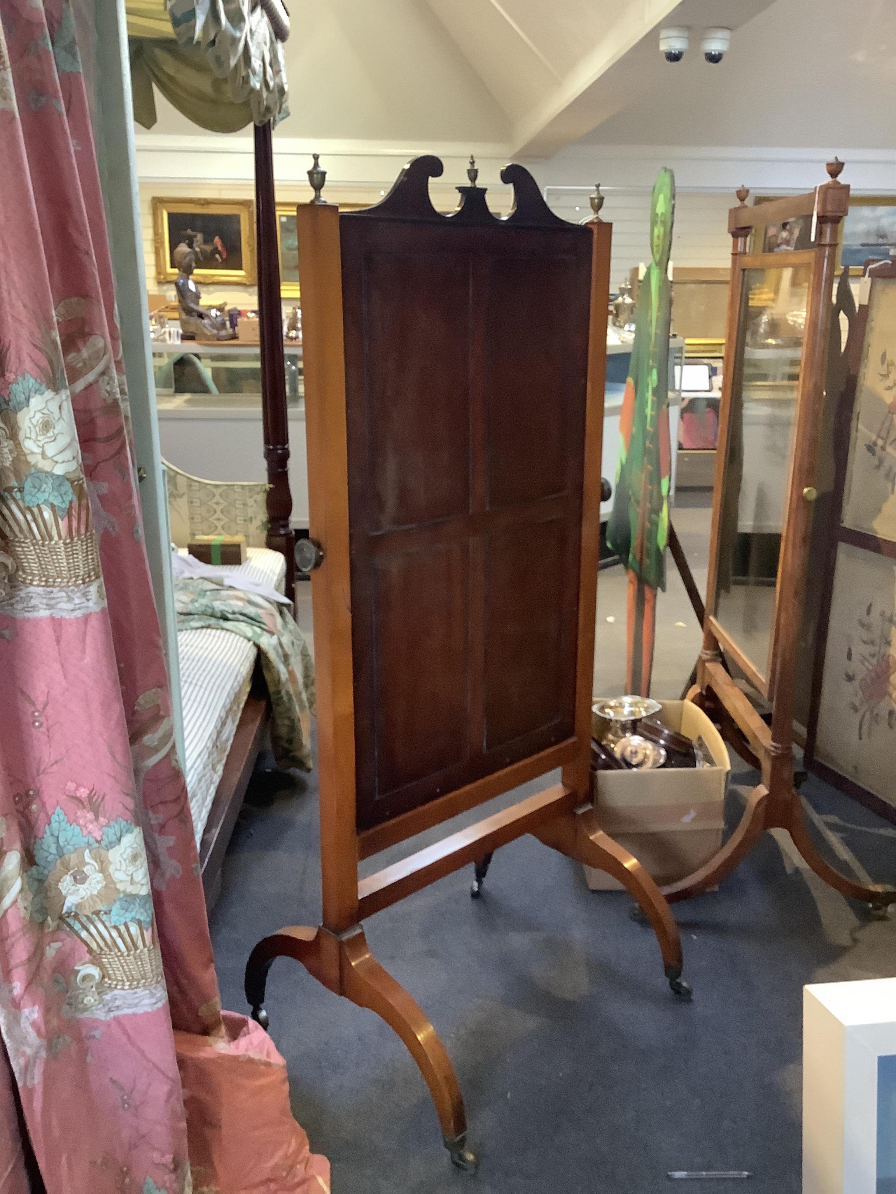 An Edwardian satinwood cheval mirror